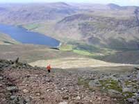 On+the+screes+of+Scafell+with+the+long+descent+to+Wasdale+ahead.